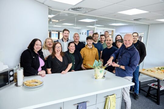 Celebrating 20 Years of Success cyan solutions team birthday